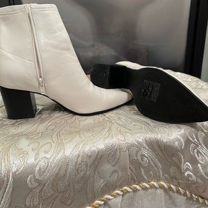 White boot with zipper and thick heel